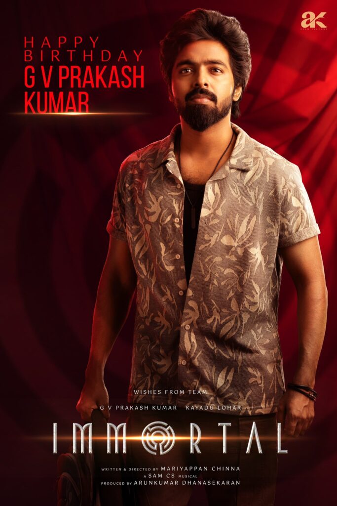 GV Prakash Kumar in a floral shirt against a red backdrop for the Immortals GV Prakash Movie birthday poster, featuring the text "Happy Birthday GV Prakash Kumar" and "Wishes from Team Immortal.